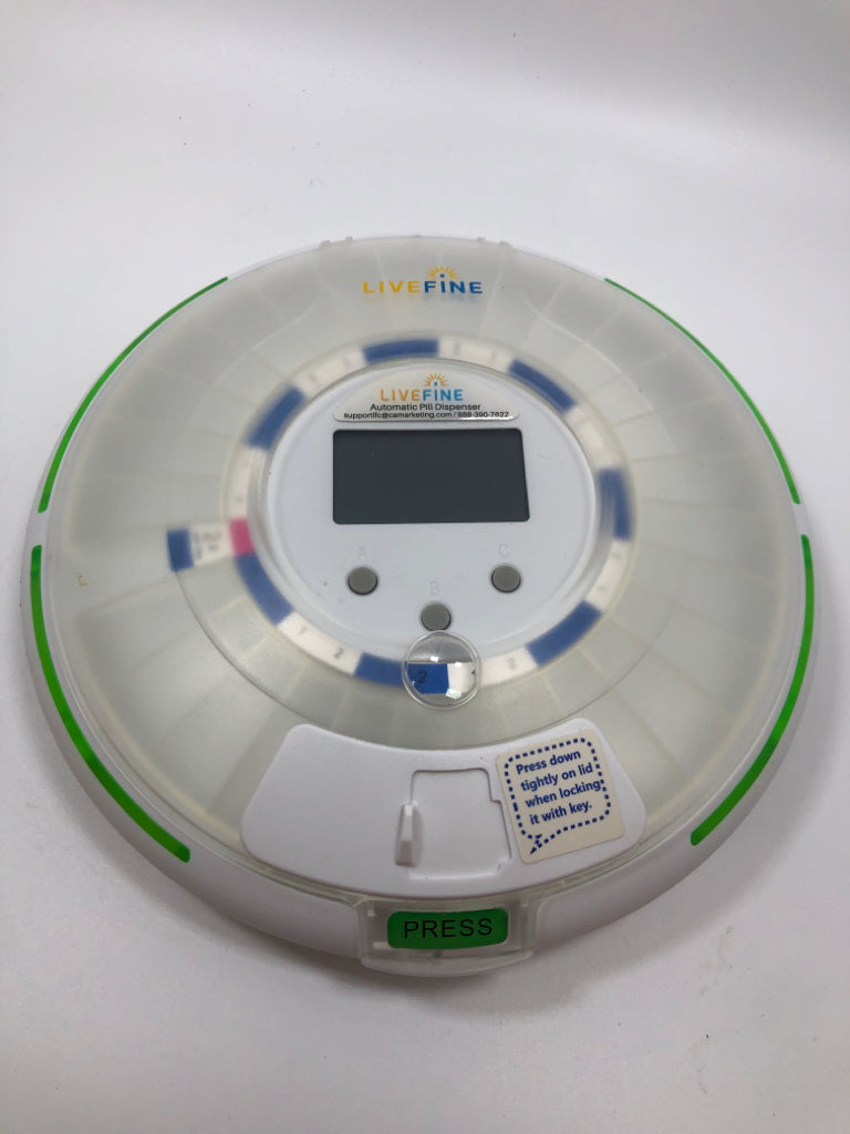 NIB FROSTED AUTOMATIC PILL DISPENSER.