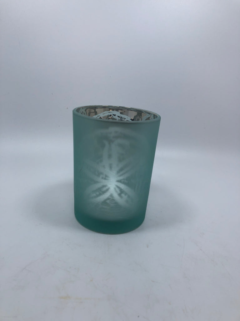 FROSTED SAND DOLLAR TEA LIGHT HOLDER.