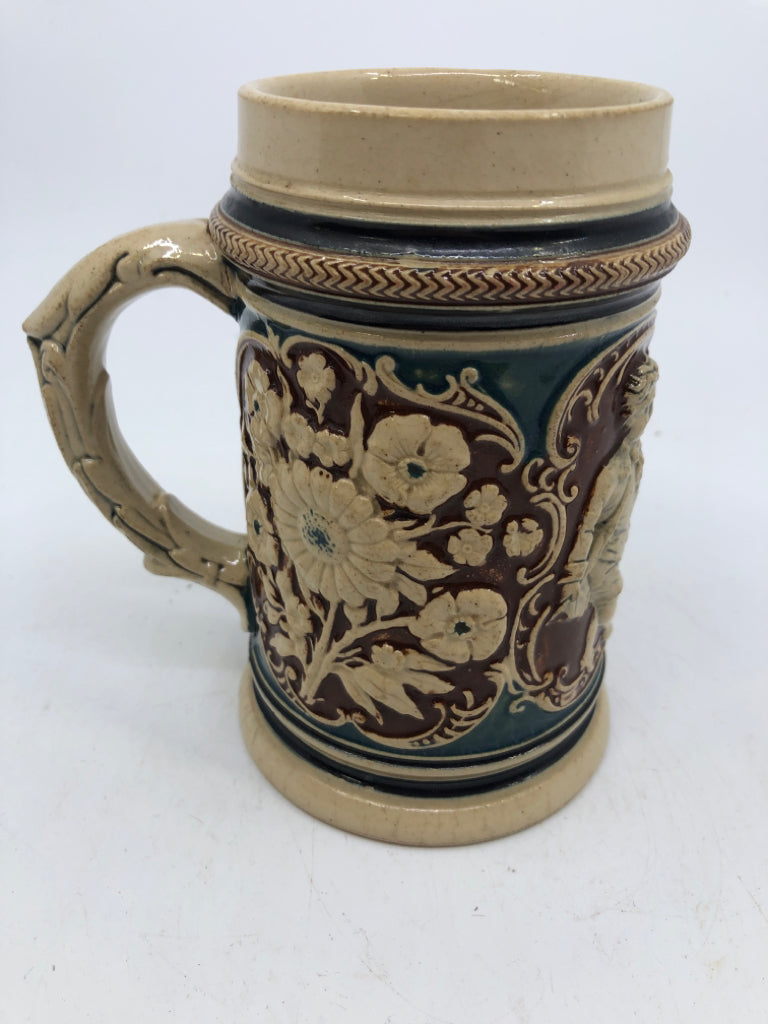 VTG EMBOSSED BOY AND GIRL DANCING STEIN.