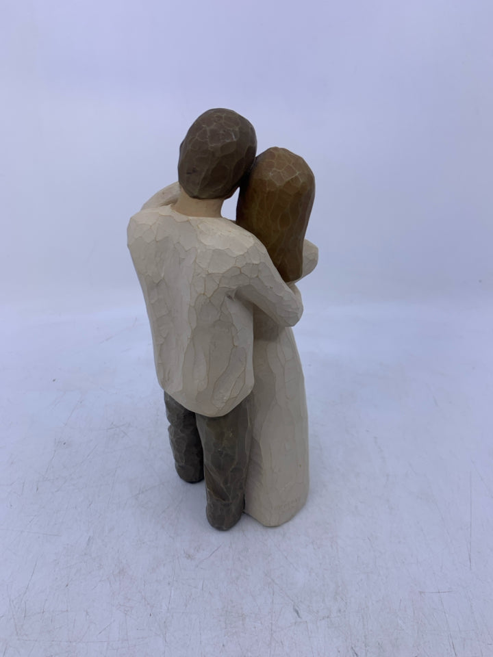 MAN/WOMAN HOLDING EACHOTHER "TOGETHER".