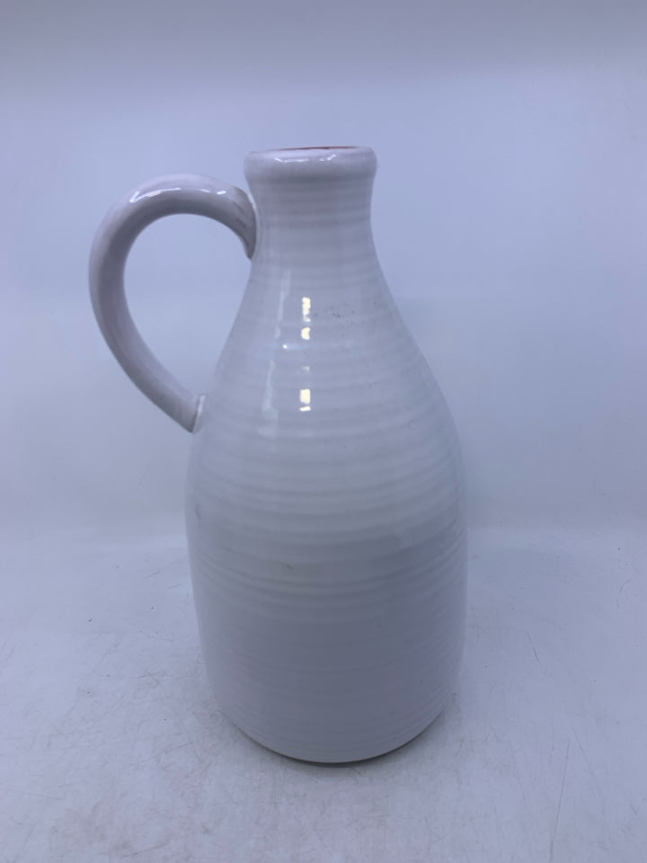 WHITE VASE RIBBED LOOK W/ HANDLE.