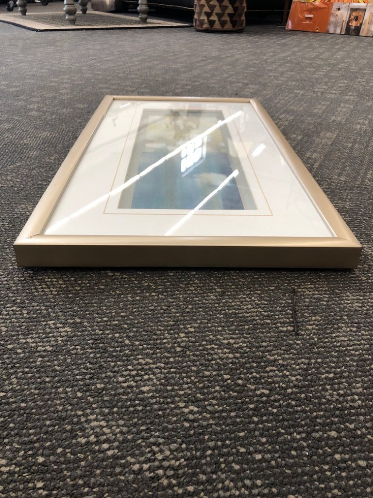 WATER COLOR ABSTRACT FLORAL WALL ART IN SILVER FRAME.