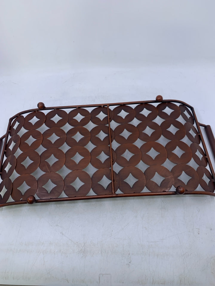BROWN FOOTED METAL TRAY W/ LIFTED EDGES PIERCED CIRCLES.