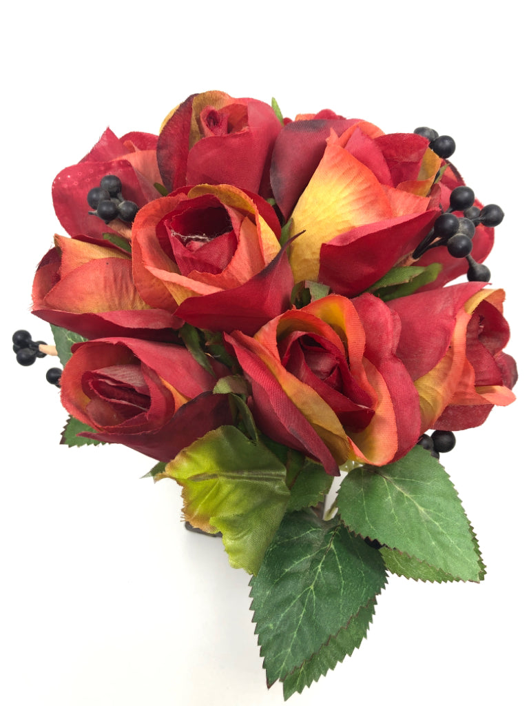 RED FLORALS IN FROSTED ORANGE PEDESTAL VASE.