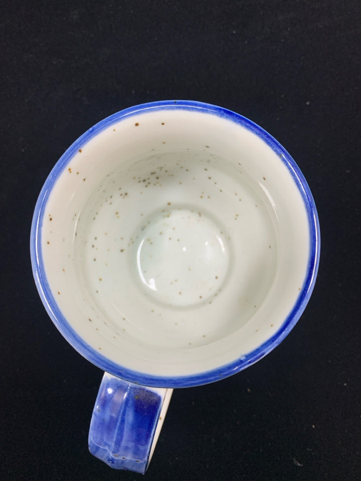 BLUE CERAMIC DOTTED MUG W/ORANGE FLOWERS.