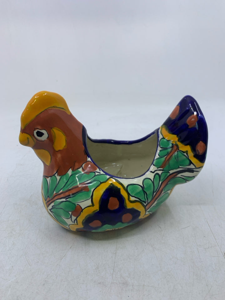 TERRA COTTA LAYING HEN W/ COLORFUL DESIGNS.