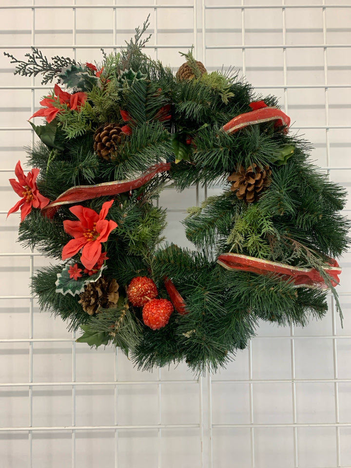 POINSETTIA AND PINECONE WREATH.