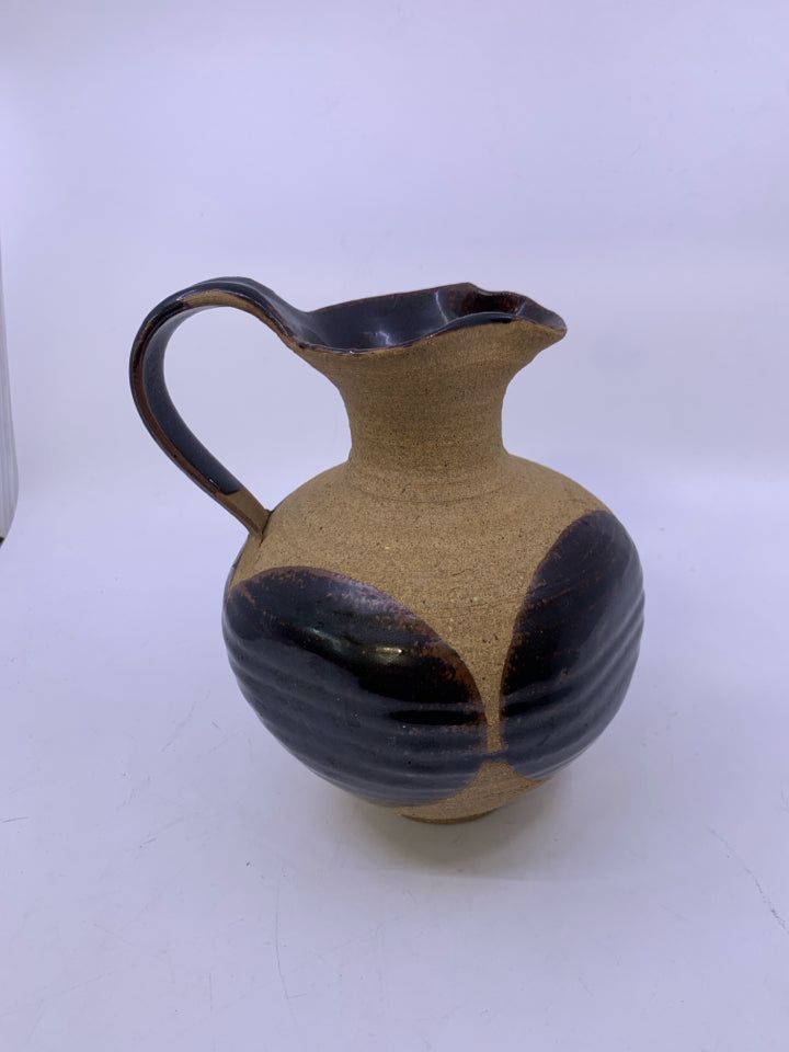 MATTE TAN PITCHER W/ LARGE DARK BROWN SPOTS/INSIDE.