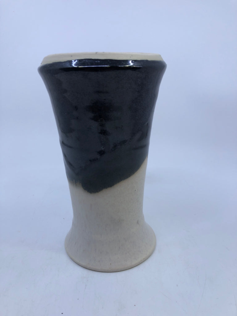 BLACK/WHITE POTTERY VASE.