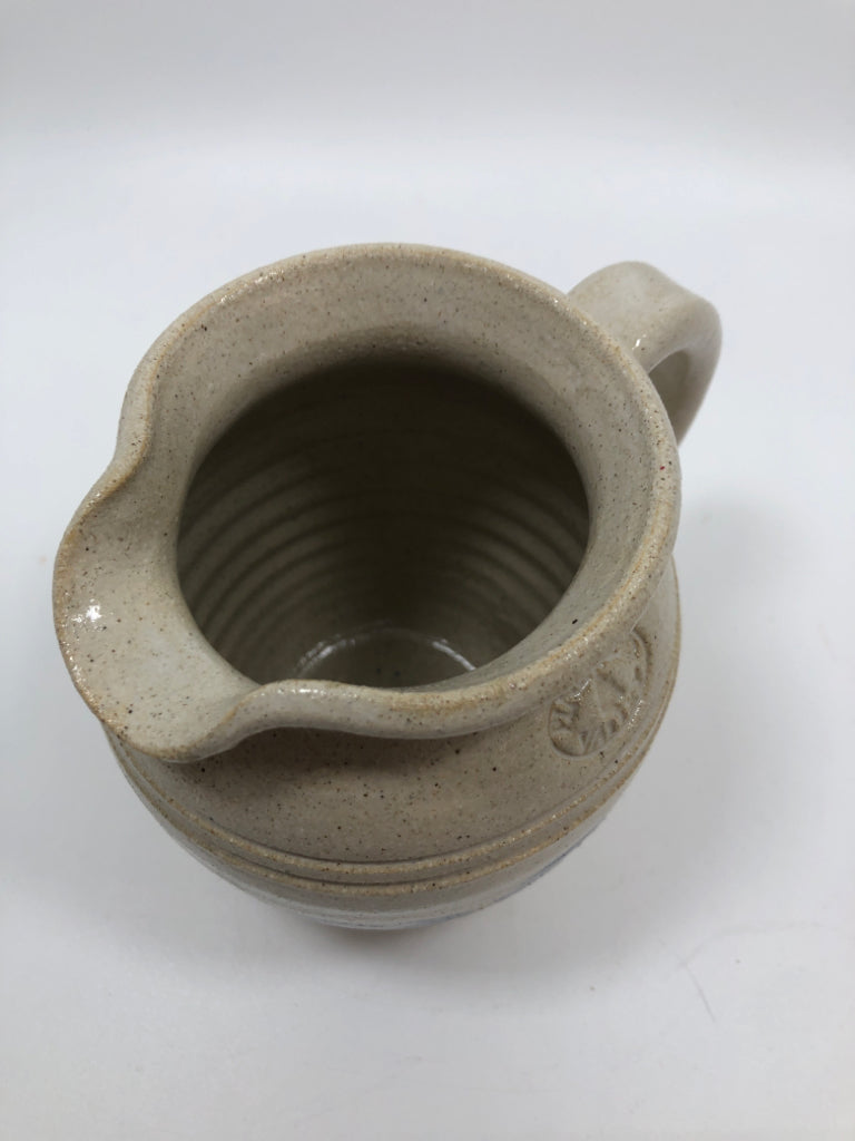BEIGE PITCHER W/ BLUE HEART STONEWARE.