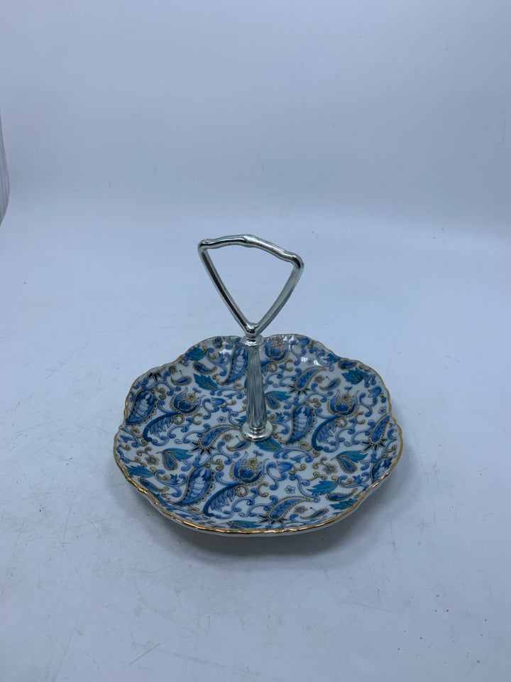 BLUE PAISLEY BASE W/ METAL HANDLE IN CENTER JEWELRY CATCH.