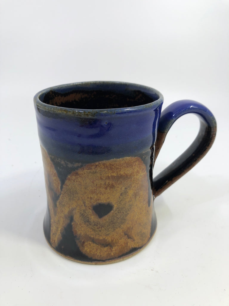BLUE POTTERY MUG W/ BROWN&BLACK DESIGN.