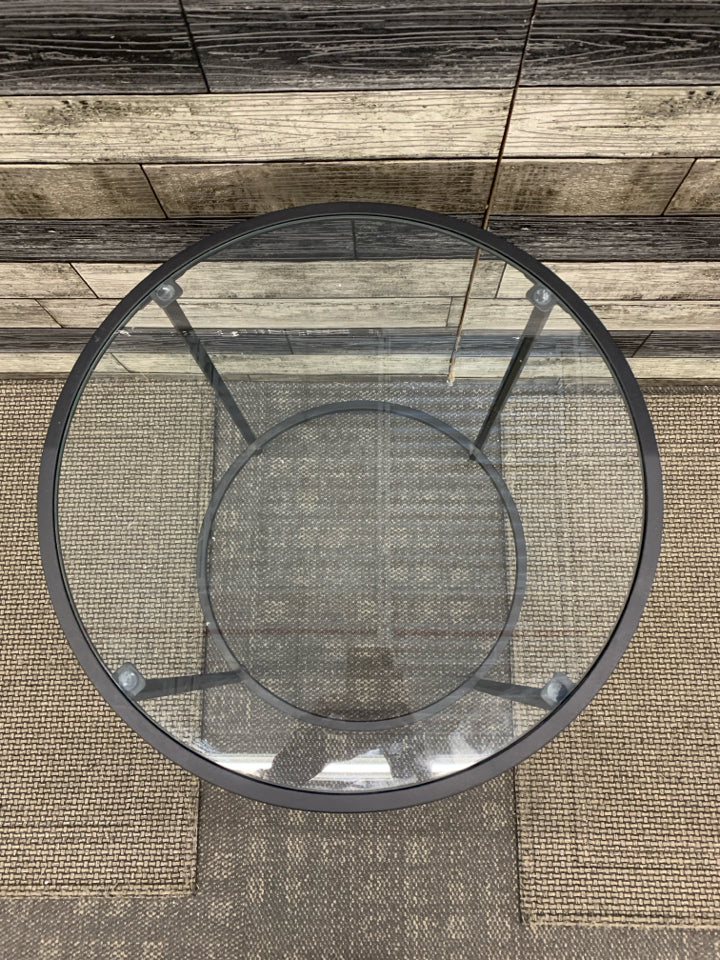 ROUND BLACK METAL SIDE TABLE W/GLASS TOP.