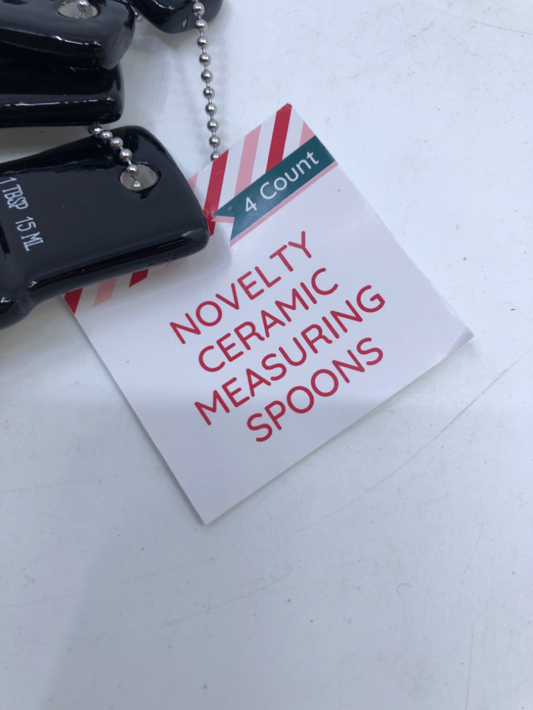 NWT SNOWMAN MEASURING SPOONS.