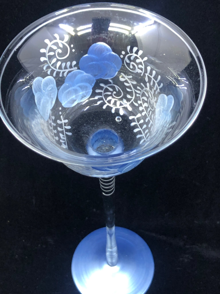 TALL GLASS VOTIVE CANDLE HOLDER BLUE FLORAL AND BLUE BASE.