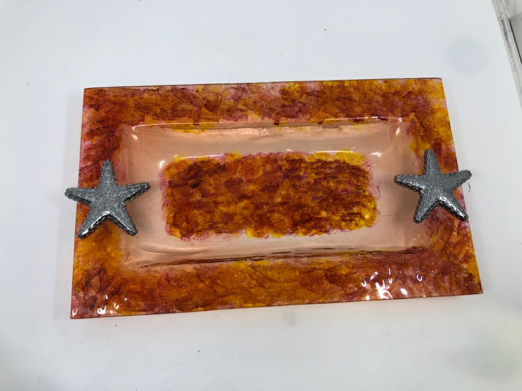 ORANGE RECTANGLE GLASS TRAY W/SILVER STARFISH.