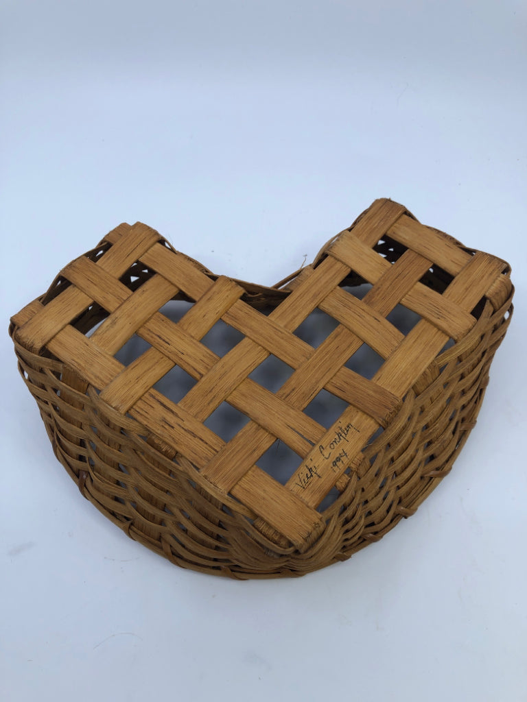 WOVEN HEART SHAPED BASKET.