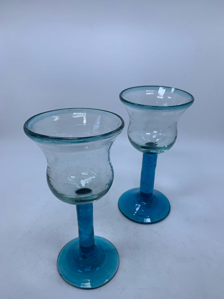 2 HAND BLOWN BLOWN BLUE STEM WINE GLASSES.