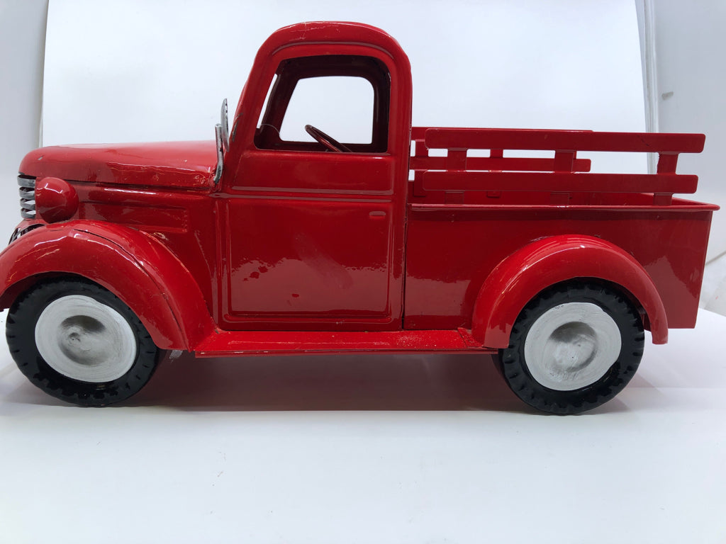 RED PICKUP TRUCK FIGURINE.