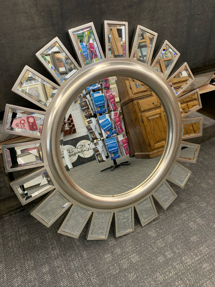 LARGE ROUND SILVER WALL MIRROR.