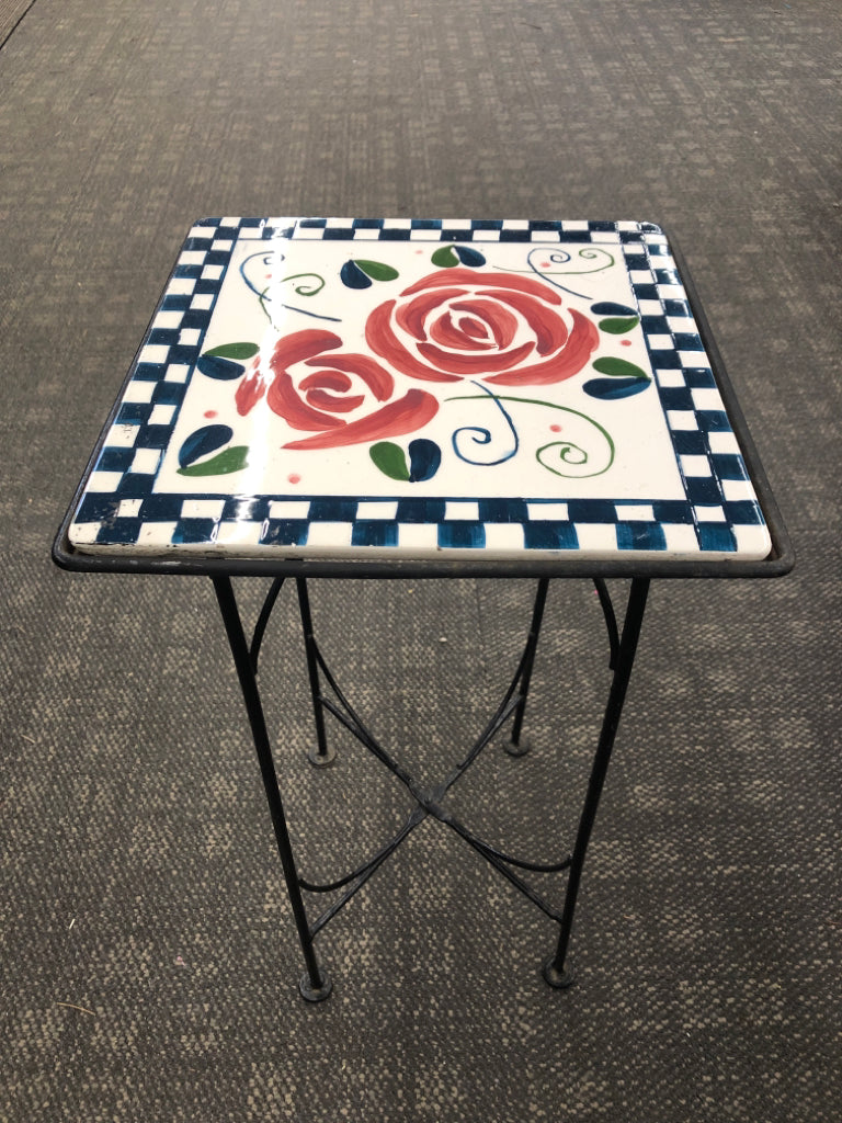 CHECKERED PLANT STAND WITH PAINTED ROSES.