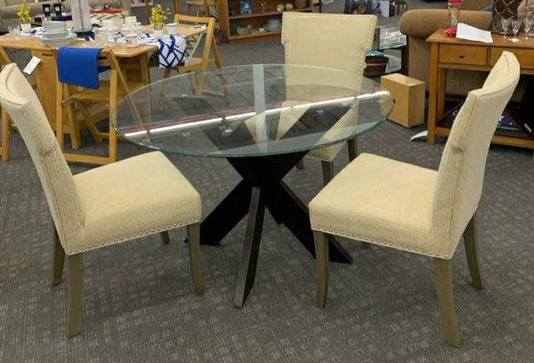 DARK WOOD X BASE TABLE WITH GLASS TOP 3 CREAM NAIL HEAD CHAIRS.