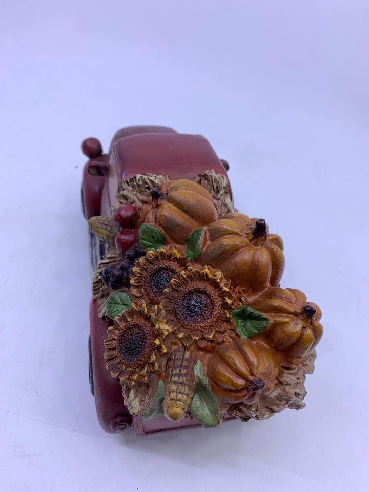 RED CERAMIC TRUCK WITH PUMPKINS/SUNFLOWERS.
