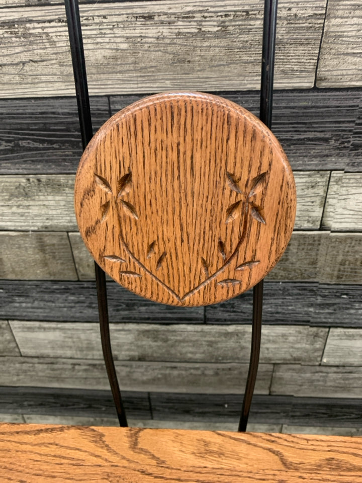 WOOD BENCH W/BLACK WIRE HEART BACK REST.