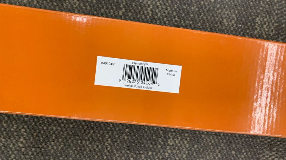 NIB 12 SPOT VOTIVE HOLDER.