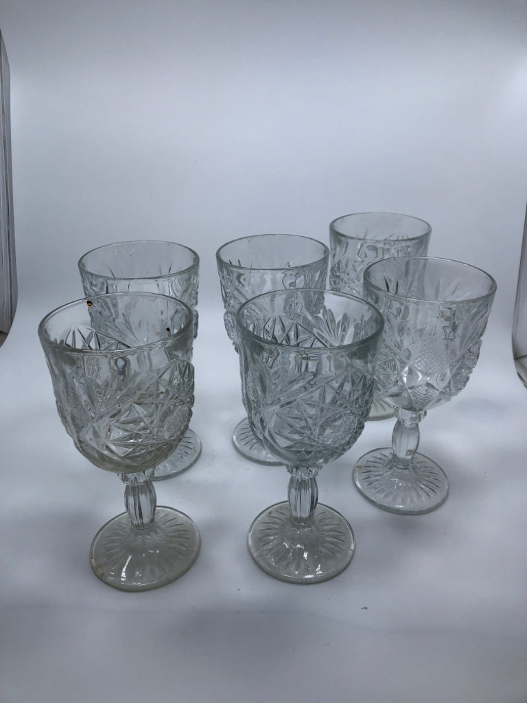 6 GLASS/CRYSTAL GOBLETS W/EMBOSSED MEDALLION DESIGN.