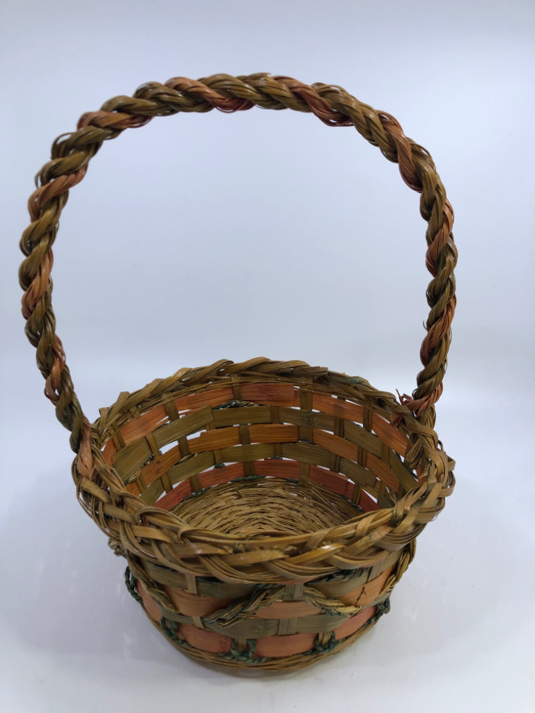 WOVEN BASKET W/TEAL BRAIDING.