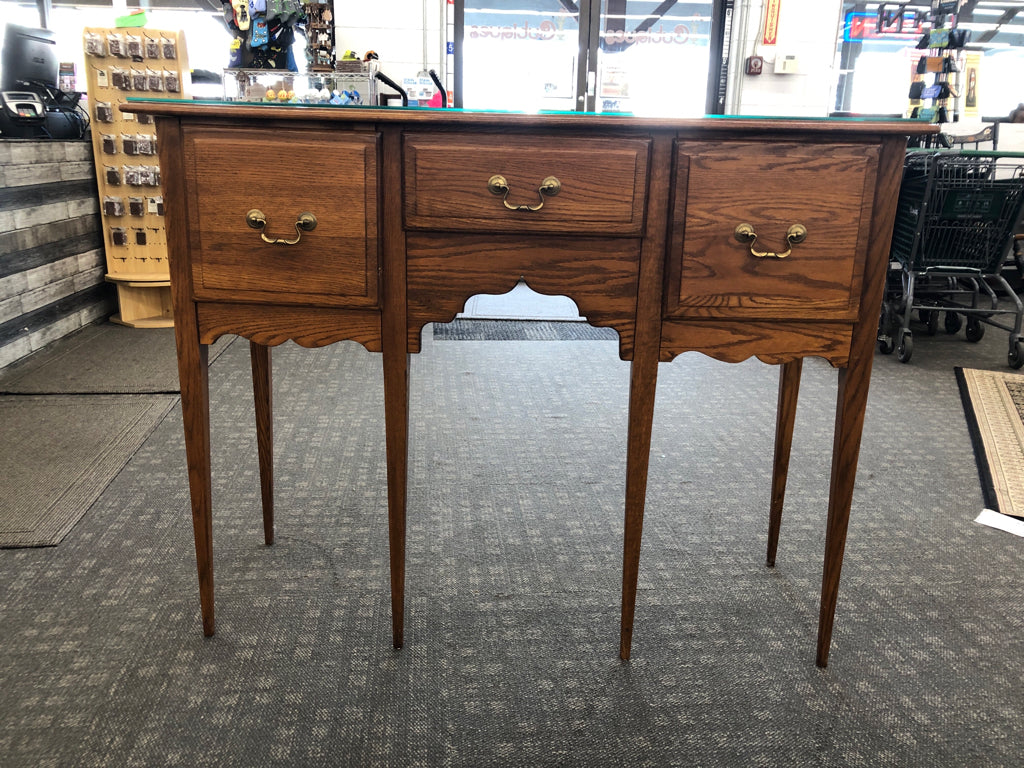 TALL WOOD BUFFET 3 DRAWER TABLE W/ GLASS TOP.