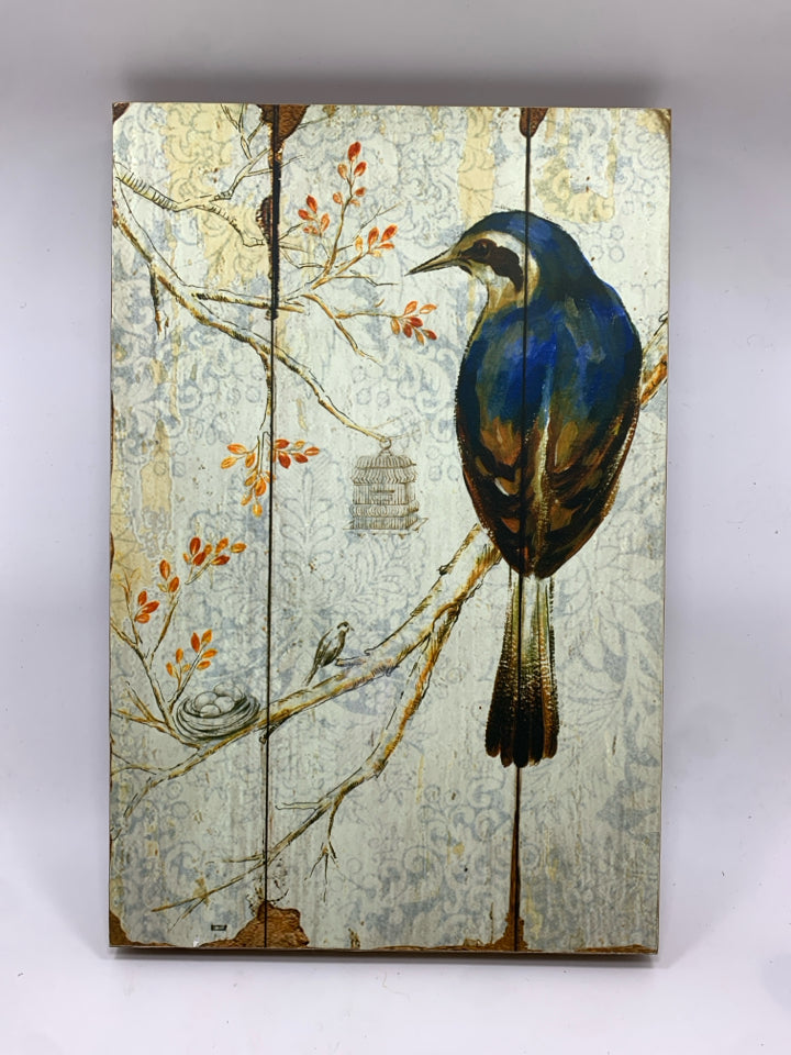 BLUE BIRD PAINTED ON WOOD WALL HANGING.