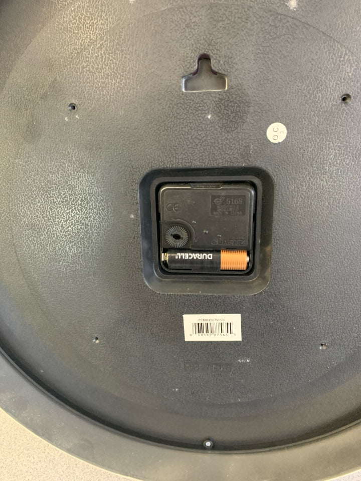 ROUND PLASTIC SILVER/BLACK WALL CLOCK.