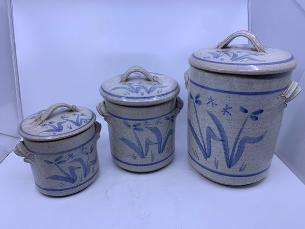 3 BROWN SPECKLED BLUE FLORAL POTTERY CANISTERS W LIDS.