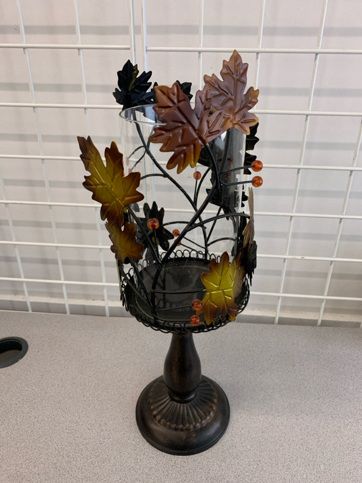 METAL LEAF PEDESTAL CANDLE HOLDER.