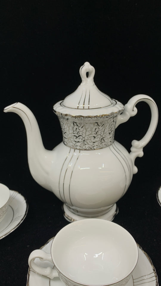 13PC FINE CHINA TEASET WHITE W/SILVER RIM.