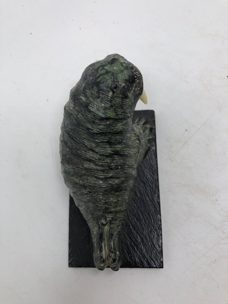 VTG STONE CARVED WALRUS W/WHITE TUSKS.