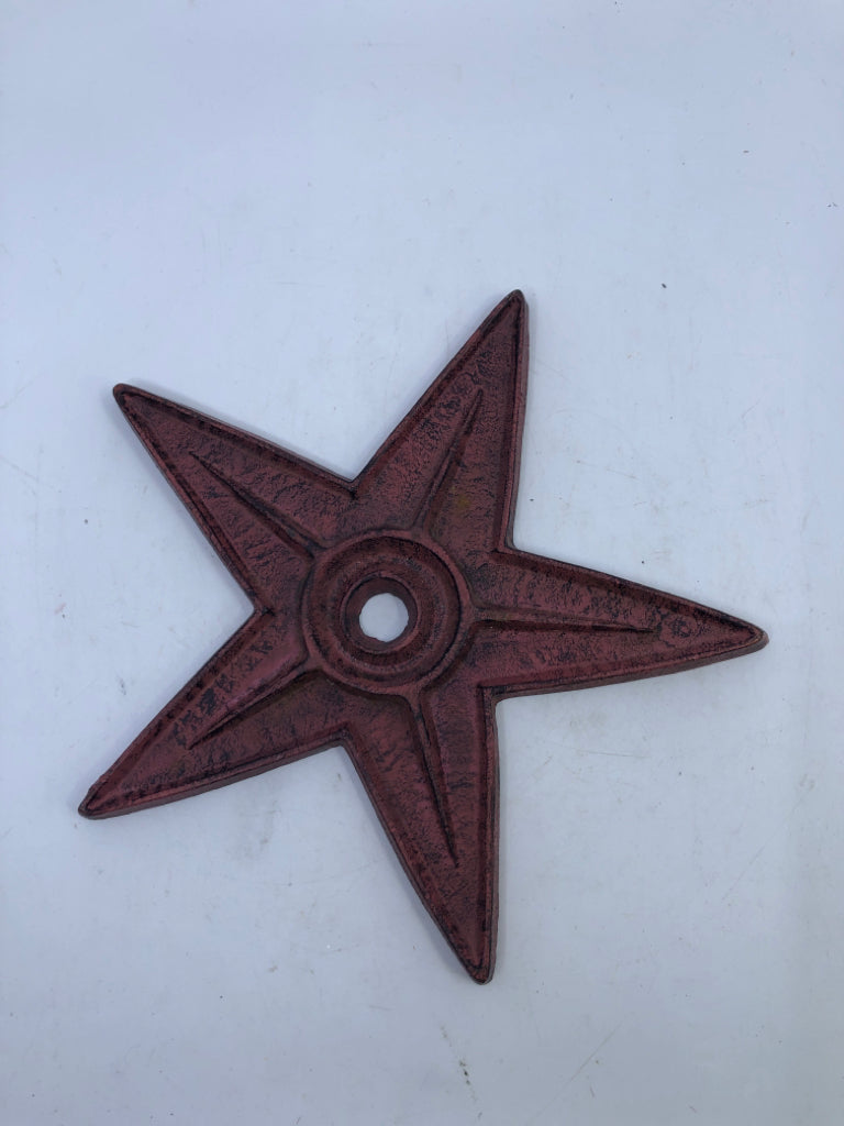 PRIMITIVE RED STAR W HOLE IN MIDDLE.