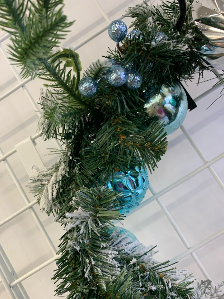 FROSTED GARLAND W BLUE AND SILVER BULBS.