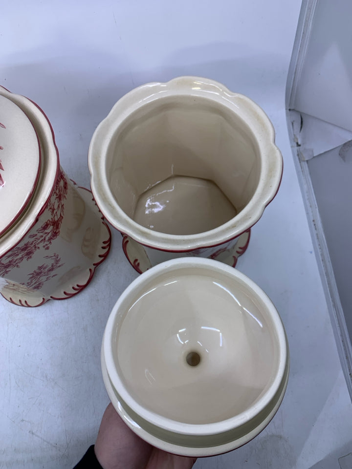 2 IVORY & RED FLORAL CANISTERS.