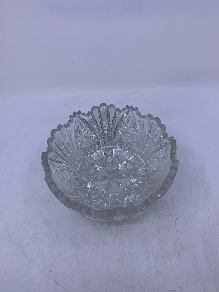 HEAVY CUT CRYSTAL BOWL W/ STAR ON BOTTOM.