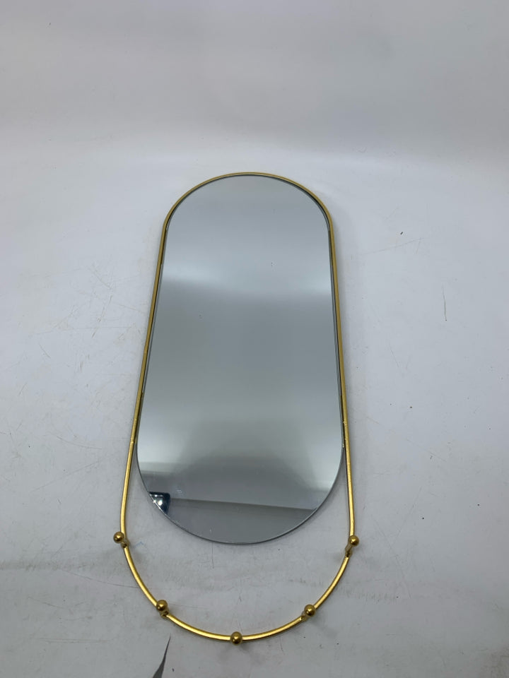 SMALL OVAL MIRROR W/ HOOKS.