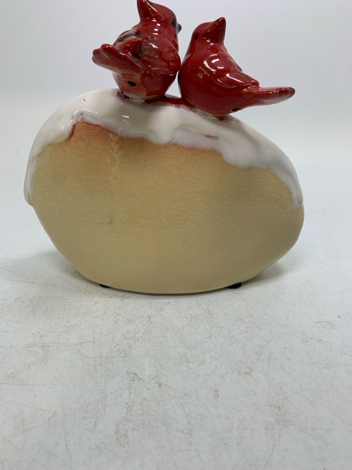 OVAL TAN NOEL ROCK W/ 2 CARDINALS.