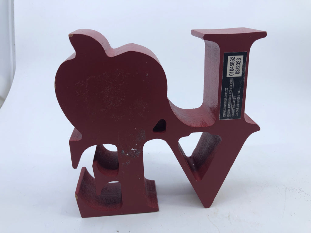 RED LOVE WITH APPLE BLOCK SIGN.