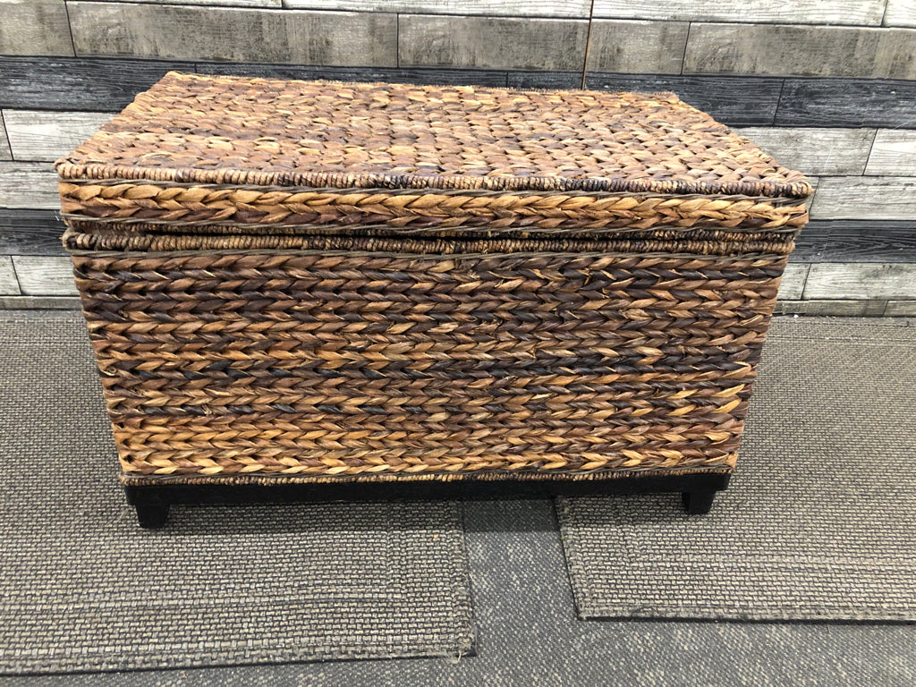 BROWN WICKER CHEST.