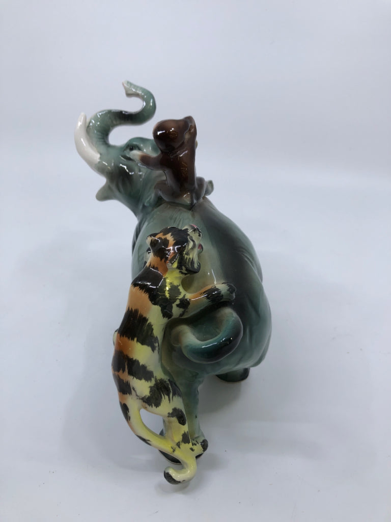 CERAMIC ELEPHANT FIGURINE W/TIGER AND MONKEY.