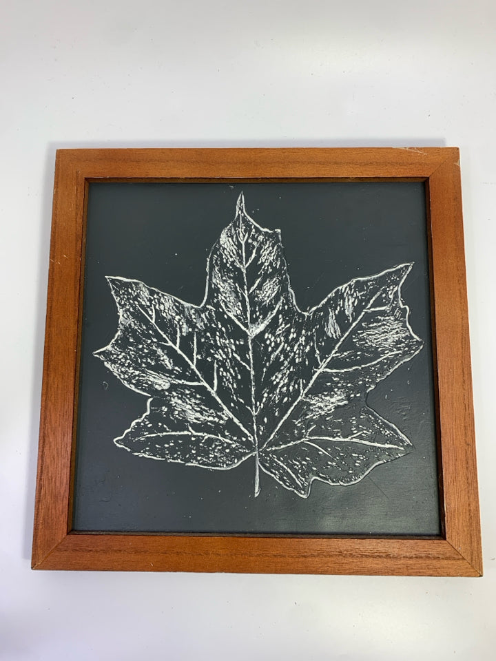 WHITE MAPLE LEAF GREEN FRAMED WALL HANGING.