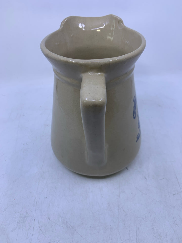 TAN POTTERY JACK DANIELS PITCHER.