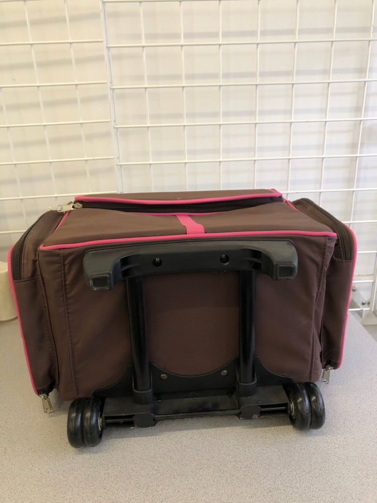 PINK AND BROWN ROLLING SCRAPBOOK CASE.